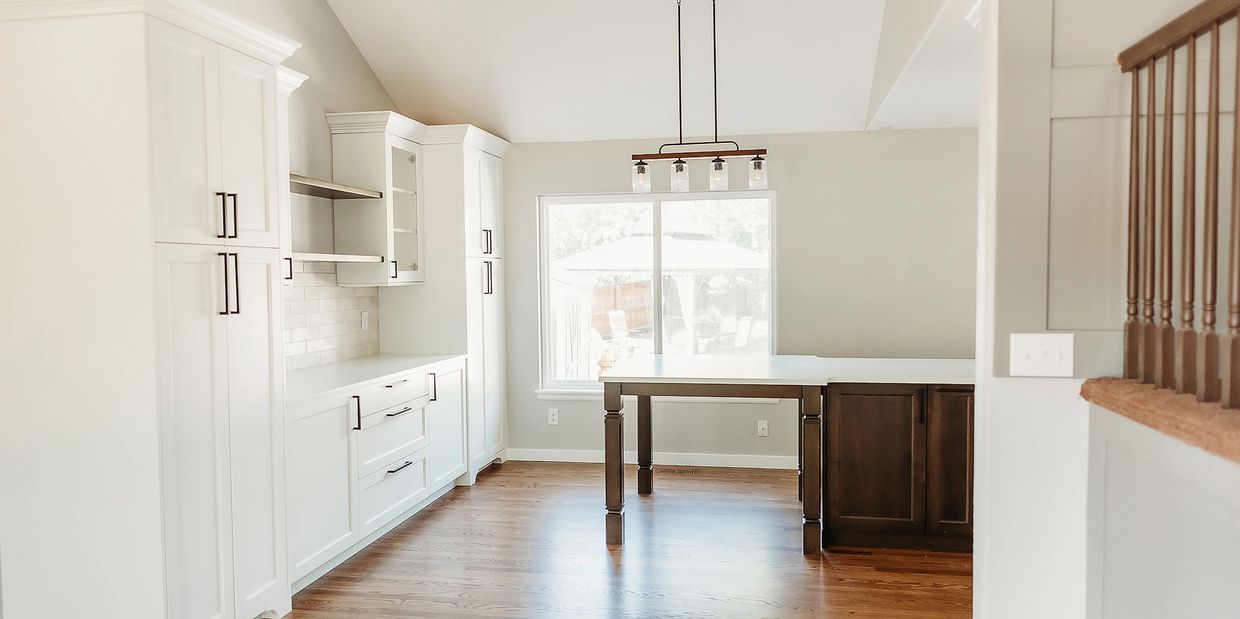 This locally crafted kitchen blends traditional and modern cabinetry for a classic enduring style.