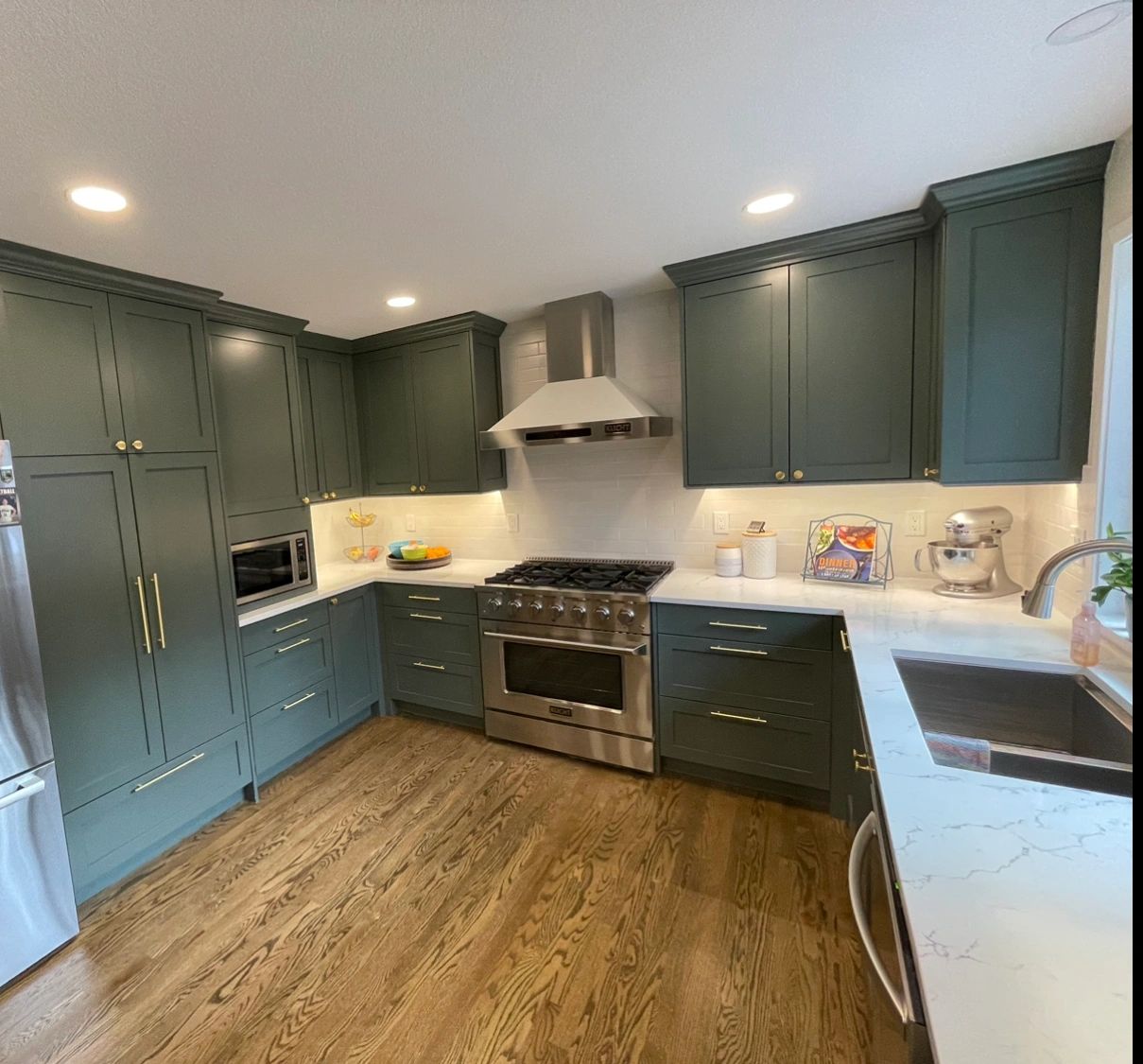 Custom classic shaker kitchen in Littleton with a large pantry and stainless steel appliances