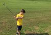 Super Lou hitting the links at the start of summer 2017.