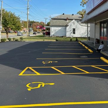 After photo of blacktop sealing and line striping by G.O.A.T. Blacktop.