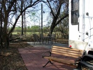 Patio, bench, and grill on most lots