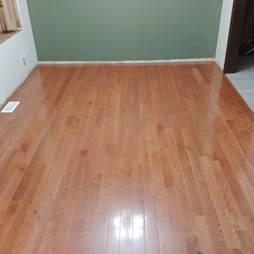 This a photo of a hardwood floor I installed. Prior to reinstalling the baseboards. 