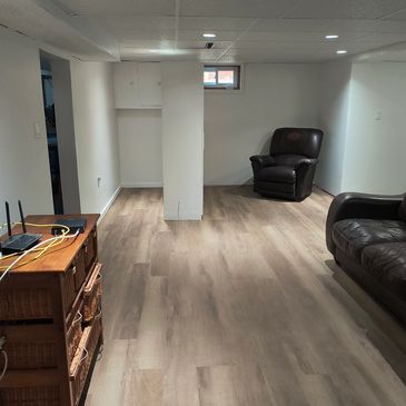 This was a basement that had flooded and had to be completely restored, including new flooring. 