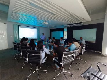 Group meeting in a conference room.