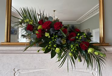 Flower arrangement over fire place