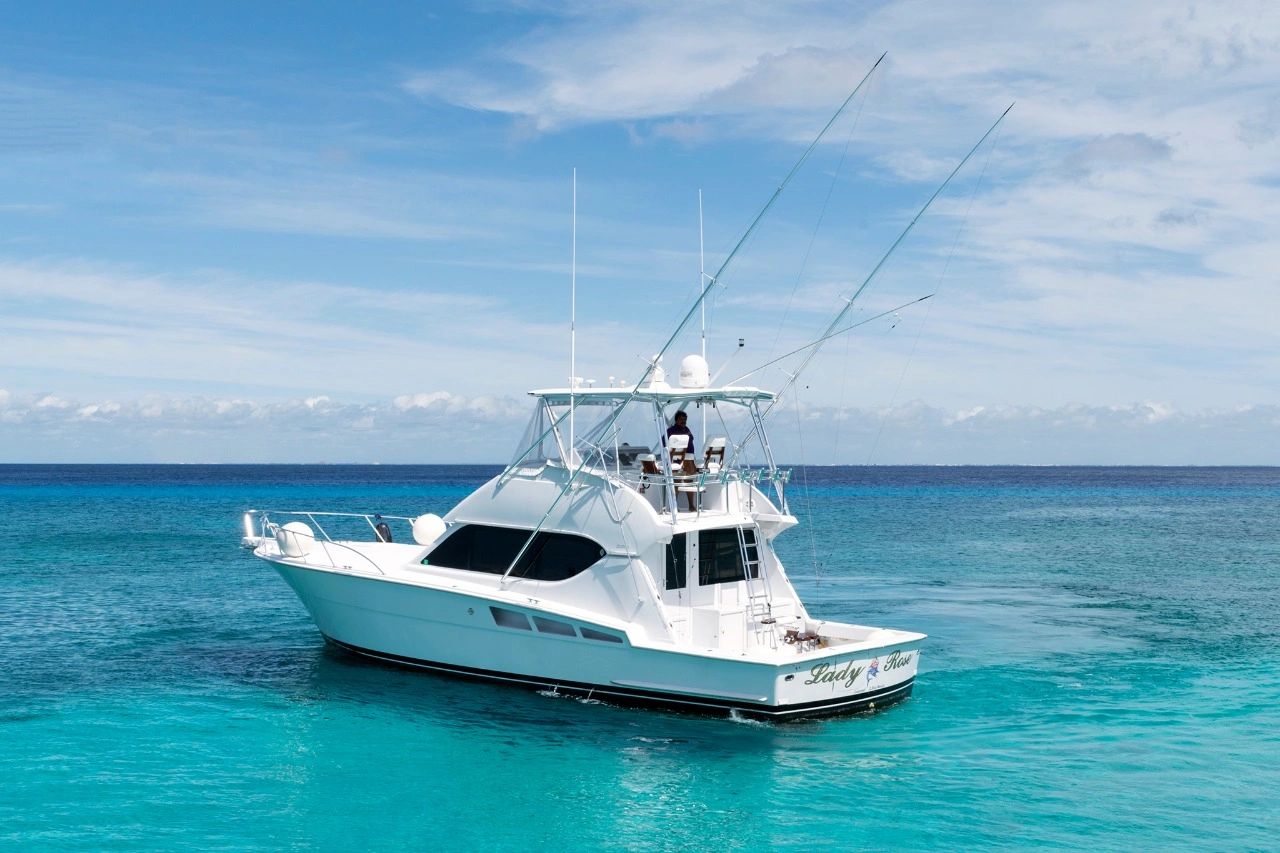 A fifty foot Hatteras fishing yacht in the beautiful waters of Cozumel.