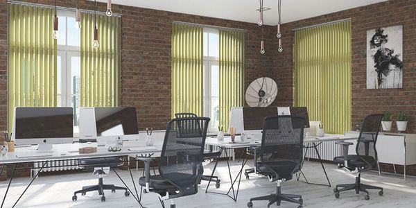 yellow vertical blinds in office 