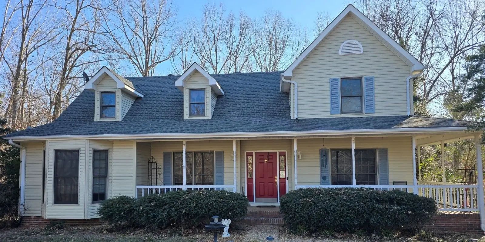 Professional house washing in Clarksville, TN on a mid-sized residential home