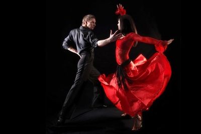 A beautiful couple dancing on the floor