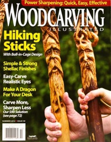 Woodcarving Illustrated magazine cover featuring intricately carved hiking sticks with faces.