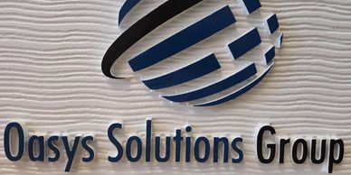 Finished custom HDU (high-density urethane) sign with carved 3D lettering and exterior paint finish.