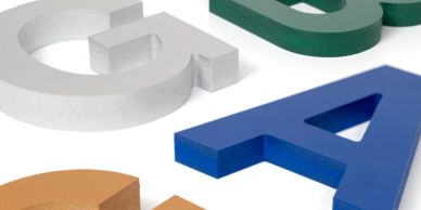 Acrylic laser-cut sign letters with polished edges.