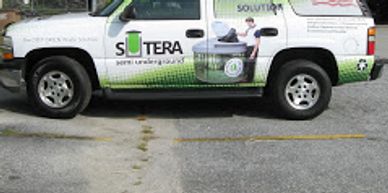 Custom vehicle graphics installed on a car for mobile advertising.
