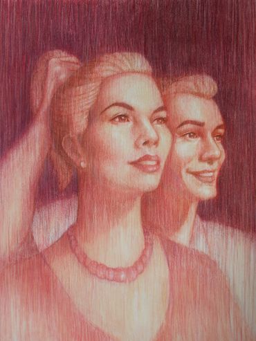 Portrait of two people with serene expressions.