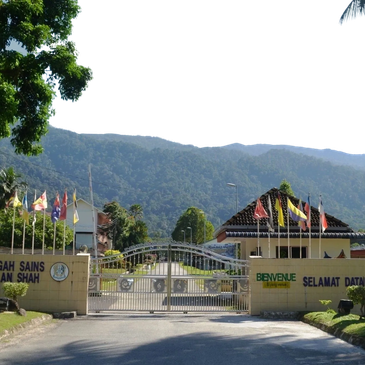 Entrance gate of a science institute with mountainous background.
