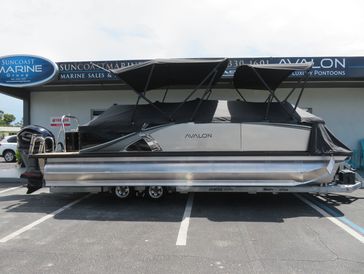 Avalon 23' LSZ tritoon sitting on trailer at Suncoast Marine Group in Sarasota, FL