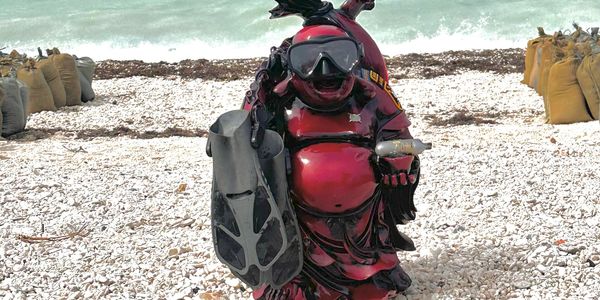 Scuba Buddha is always present on the pool deck and his presence is to encourage students to focus o