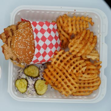 Smokey D's Chipotle Sandwich with crispy waffle fries.