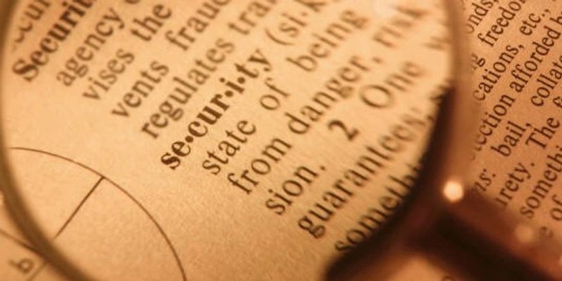 dictionary page with "security" highlighted; PRESS IMAGE to go to "National Security Cases" page
