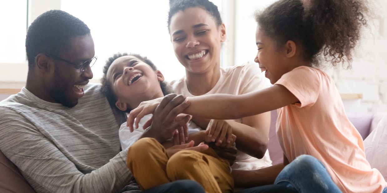 A family enjoying a kind moment