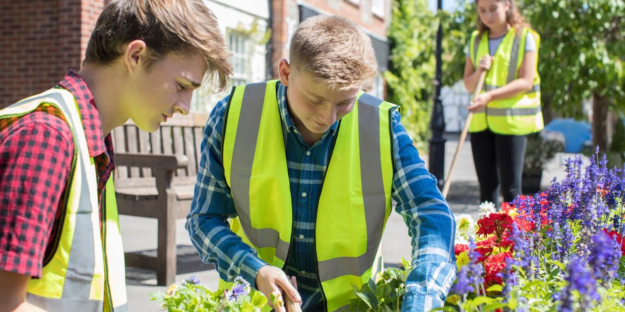 Teens being active by volunteering in their community