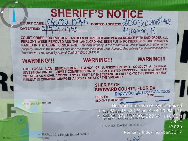 Sheriff's eviction notice posted at a property in Miramar, Florida.