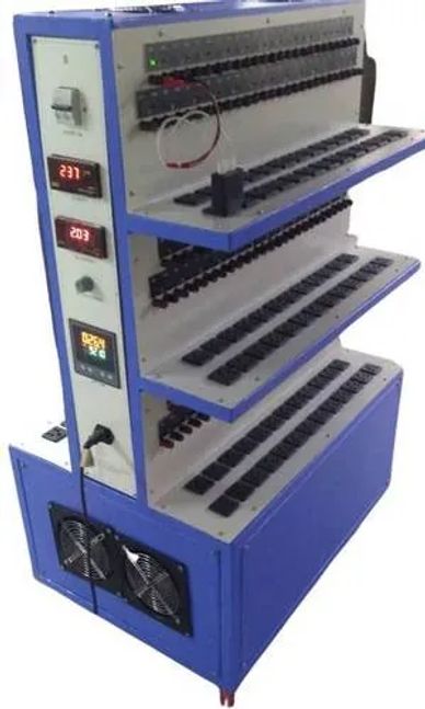 Blue multi-tier electronic device with multiple slots and fans.