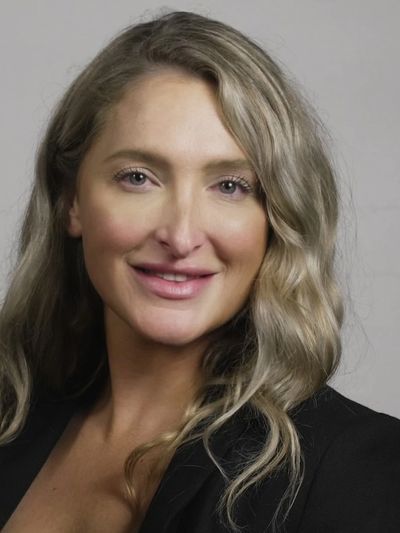 women smiling in headshot