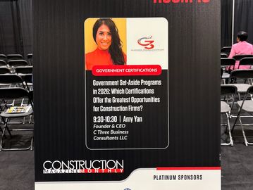 Sign promoting a session on government set-aside programs for construction firms.