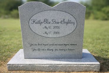 Gravestone for Kaitlyn Elise Bass-Singleton with dates and a heartfelt message.