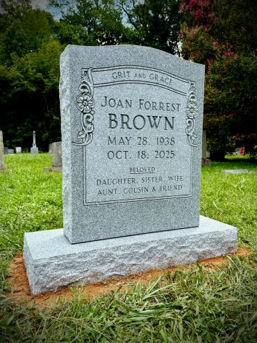 Gravestone of Joan Forrest Brown in a cemetery.