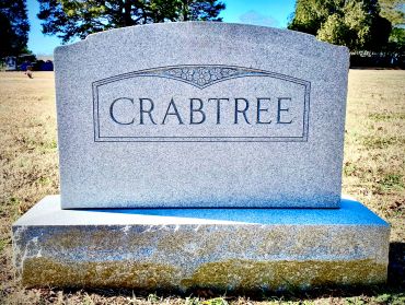 A gravestone with the name Crabtree.