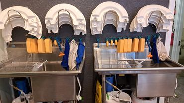 These utility sinks capture clay to prevent it from going down the drain!