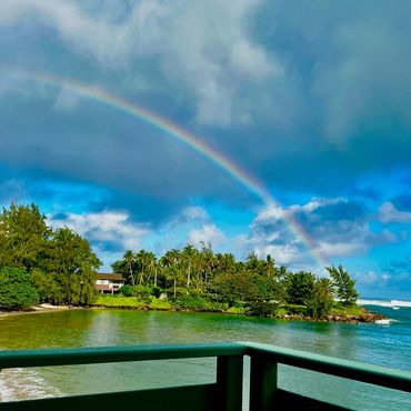 Experience stunning rainbows over the ocean at this serene Kawela Bay vacation rental.