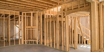 Pre-drywall inspection photo. Foundation, framing, siding, and roofing are complete, or dried-in.