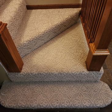 Tan stair carpet installation done by Flooring It KC in blue springs 