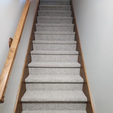 Grey stair carpet installation done by Flooring It KC in liberty