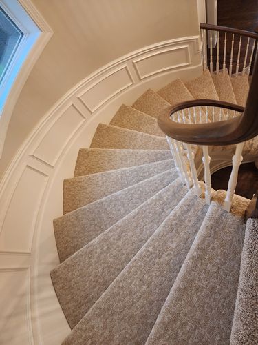 curved stair carpet installed by flooring it kc in Leawood 