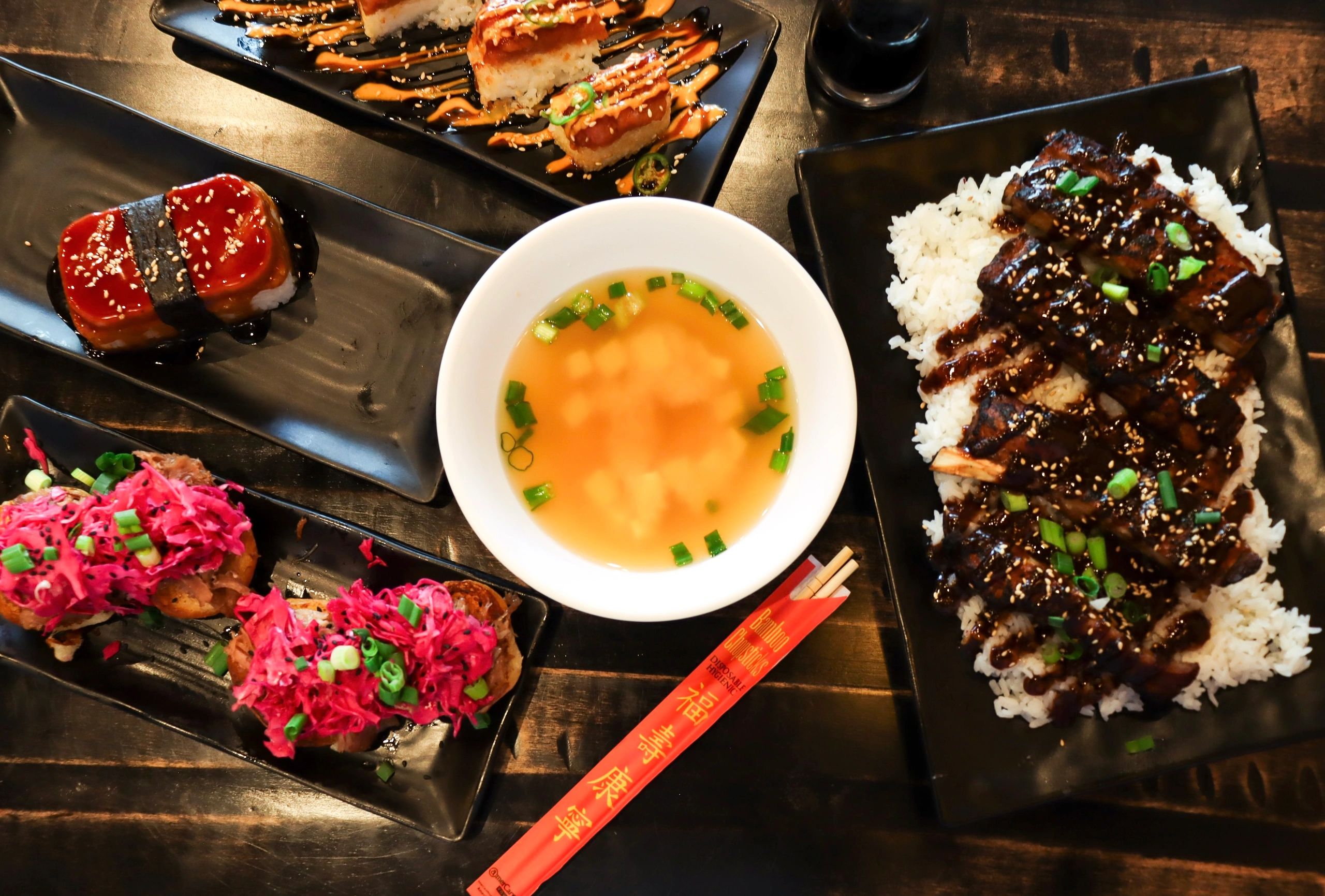 Miso Soup, Spam Musubi, Sticky Asian Pork Ribs, Spicy Tuna Crispy Rice, and Kalua Sliders