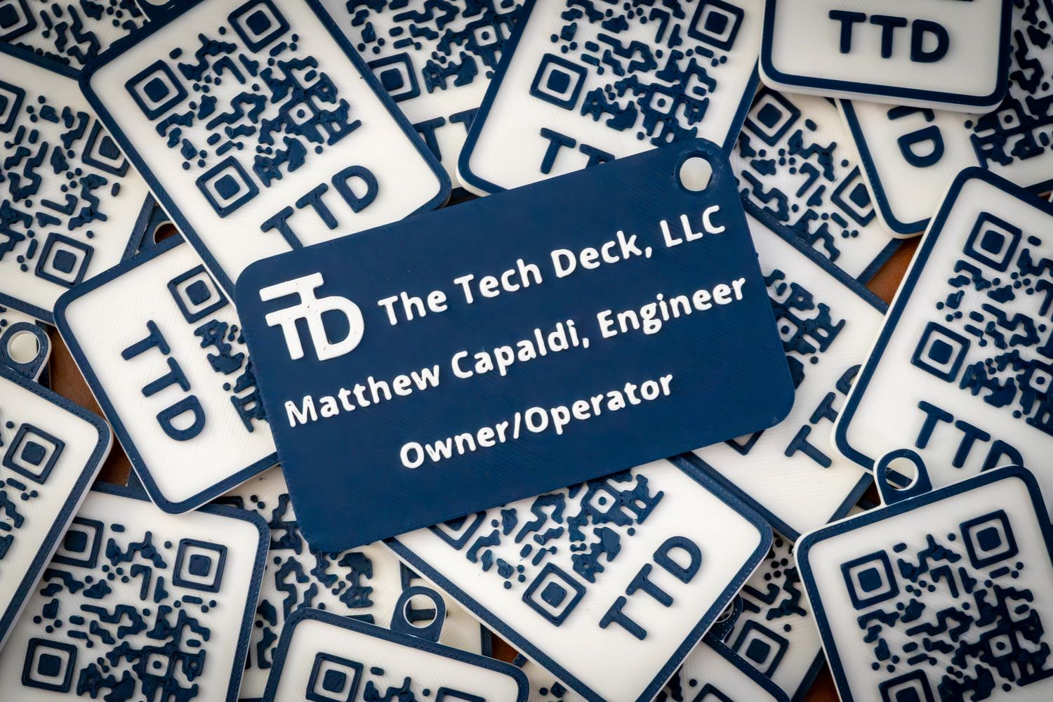 Business card for Matthew Capaldi, Engineer at The Tech Deck, LLC, among QR code tags.