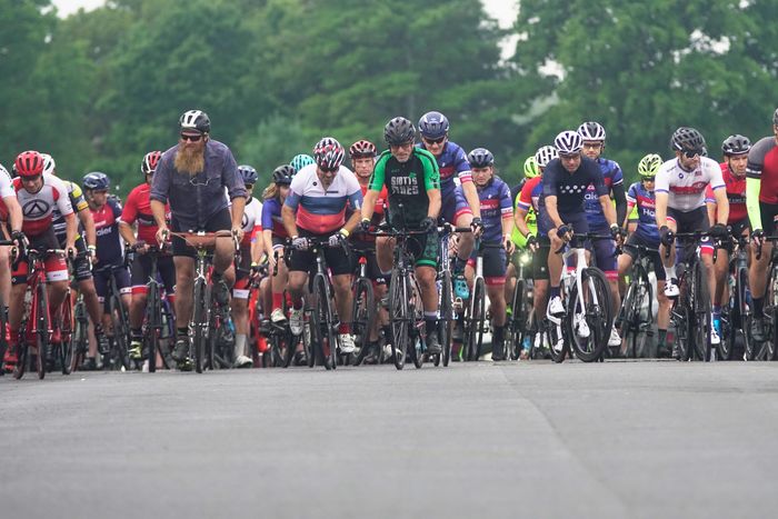 Cyclists lining up to begin their ride.