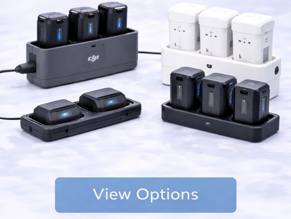 Multiple DJI battery chargers with batteries in a neat arrangement.