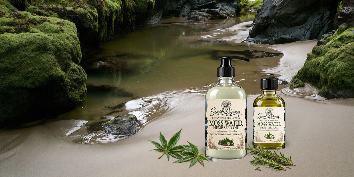 Bottles of moss water hemp seed oil lotion by a mossy creek.