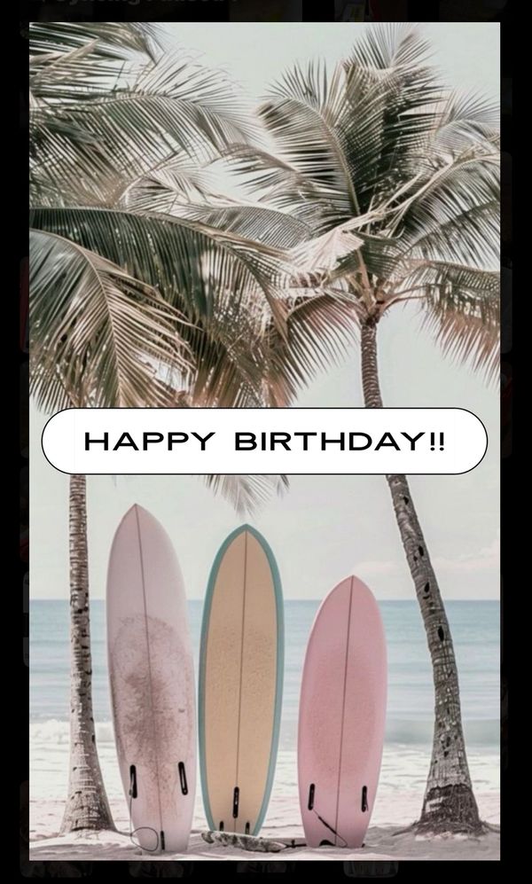 Three surfboards on a beach with palm trees and a 'Happy Birthday' message.