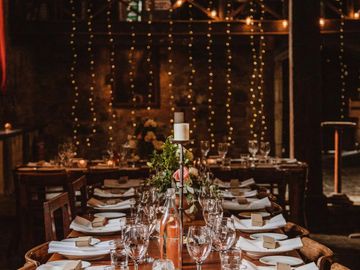 Romantic Rustic Reception Setup with hanging fairy light curtains