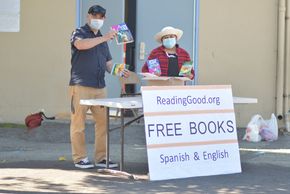 Books distribution event at Brentwood Elementary School, East Palo Alto, CA at meals pickup during C
