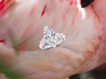 Three stone marquise diamond engagement ring