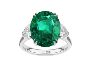 Oval shaped emerald ring with diamonds