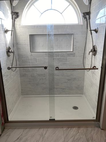Built shower in section of the bathroom that was previously a tub. Added 2 shower heads for a husban