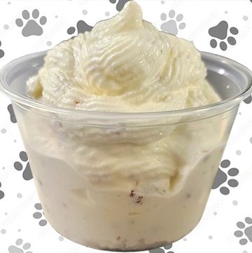 Cup of creamy white ice cream.